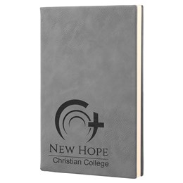 A grey leatherette journal